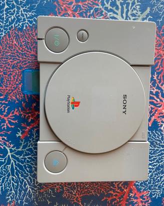 Playstation 1con cavi per muro e per televisione