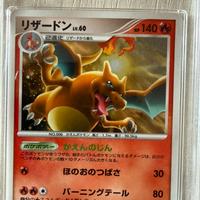 Pokemon Charizard 017/090 GRAAD 10 first edition