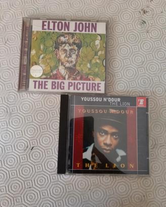 Coppia CD musicali Elton John/ Youssou N' Dour
