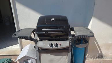barbecue da giardino a gas con pietre leviche