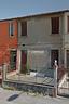 casa-accostata-in-quartiere-residenziale-