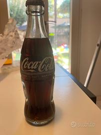 Collezionismo bottiglie piene cocacola
