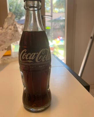 Collezionismo bottiglie piene cocacola