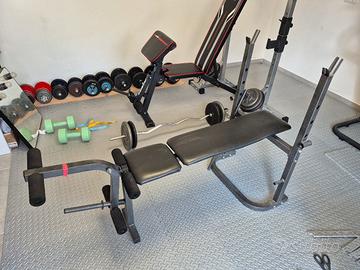 Panca piana con leg extension. 