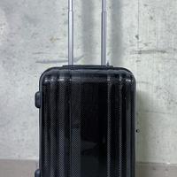 Trolley da viaggio con guscio in carbonio
