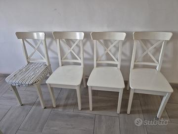 4 seggiole bianche