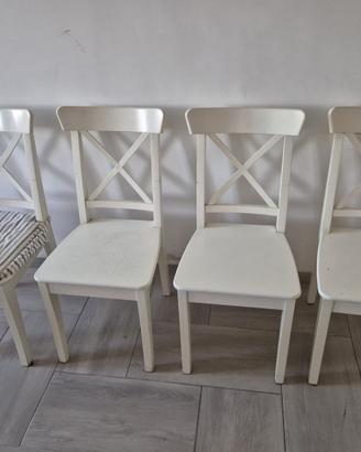 4 seggiole bianche