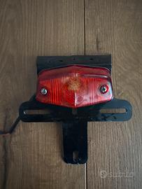 Fanalino posteriore con portatrga