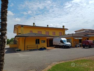 Appartamento+negozio