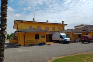 Appartamento+negozio