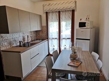 Appartamento con piscina Bibione