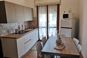 Appartamento con piscina Bibione