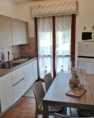 Appartamento con piscina Bibione