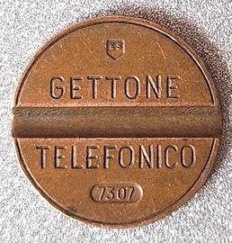 GETTONE TELEFONICO 7307 "ES" marchio incompleto (E