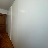 Armadio bianco  4 metri.