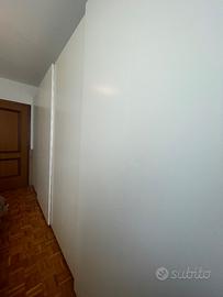 Armadio bianco  4 metri.