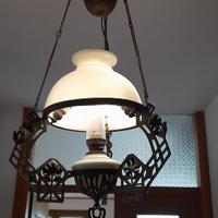 Lampada ad olio con contrappeso