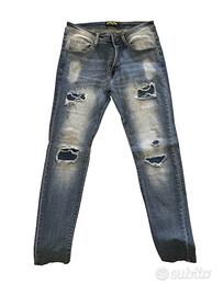 Jeans strappati uomo