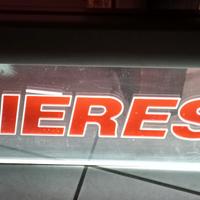 Insegna luminosa vintage.