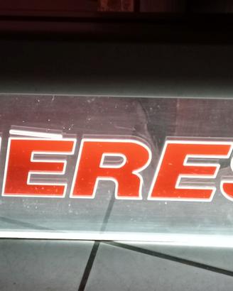 Insegna luminosa vintage.