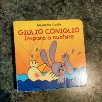 Giulio coniglio impara a nuotare 