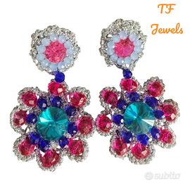 Orecchini in pizzo chiacchierino.