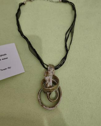gioiello in porcellana fatto a mano