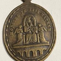 Antica medaglia in bronzo