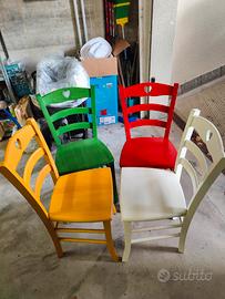 4 sedie in legno colori diversi 