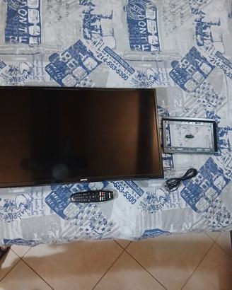tv piu supporto da parete  cm 44 x 74