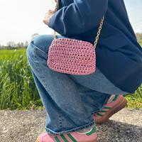 Pochette a uncinetto rosa satinato