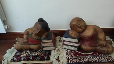 Coppia fermalibri etnici in legno