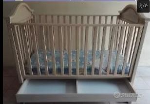 Culla Erbesi colore beige.