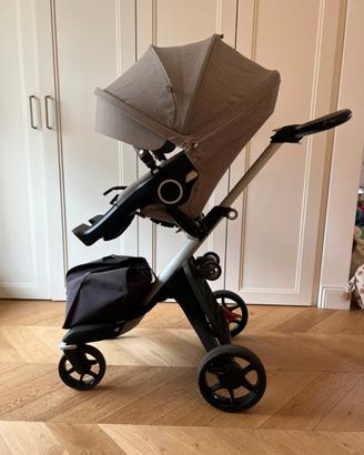 Passeggino trio Stokke, ovetto, culla e accessori
