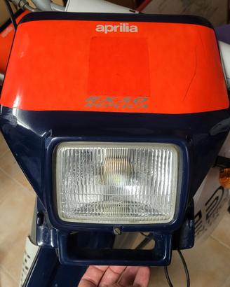 maschera faro aprilia RX 50 CD