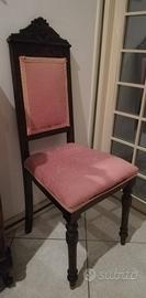 Sedia in legno scuro antica foderata di rosa