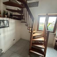 Scala a chiocciola in legno