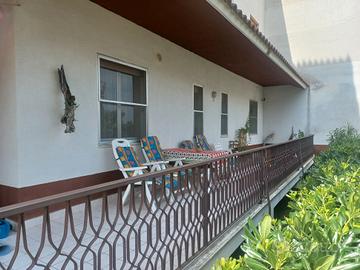 Apartamento con giardino privato