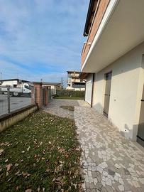 Bifamiliare con giardino su due livelli