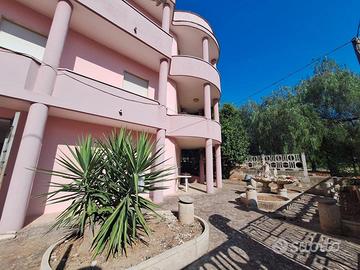 Villetta bifamiliare con giardino