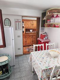 Appartamento con veranda e cortile