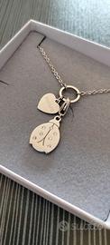 Collana con cuore pendente + ciondolo coccinella