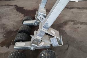 Rulli laterali basculanti con 4 ruote per carrello