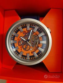 Swatch ORANGE IN THE WORKS

