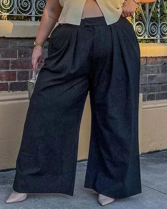 Pantaloni sartoriali gessati a gamba larga