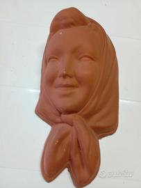 Maschera vintage decorativa in terracotta