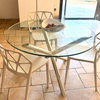 Tavolo tondo in vetro e acciaio