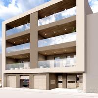 Trivani in costruzione con posto auto