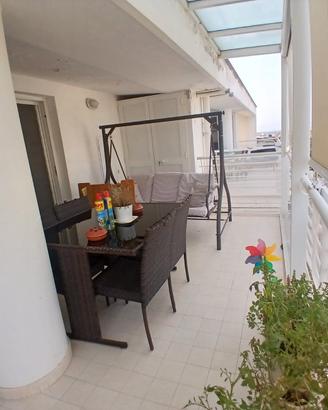 Appartamento con terrazzi e box auto