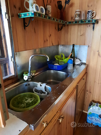 Roulotte con casetta in legno